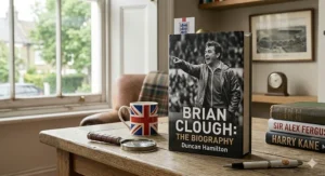 Alt text for a biography book of Brian Clough, focusing on his legendary managerial era in British football.