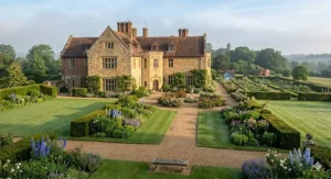 Alt text for image 6: A photorealistic depiction of Chartwell House in Kent, Churchill’s beloved country home, showing the stone architecture and manicured English gardens.